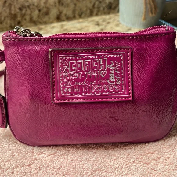 Coach
Poppy Plum/Purple Patent Leather Wristlet - Picture 3 of 7